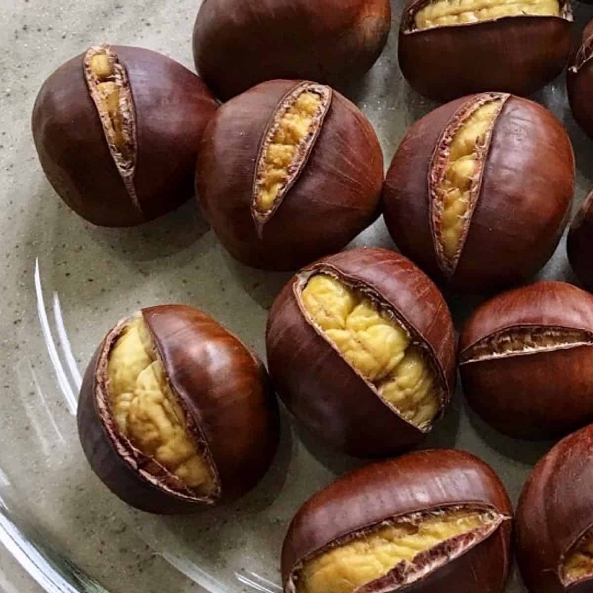 Roasted chestnuts on a plate.