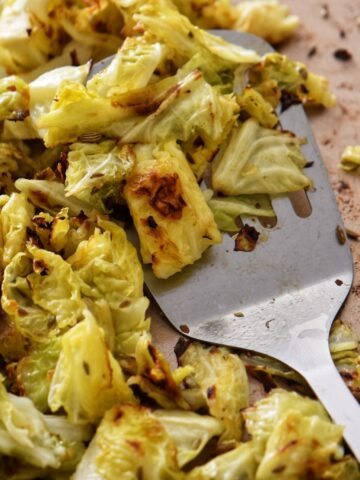 Crispy looking cabbage on a sheet pan.