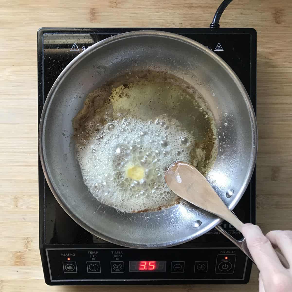 Butter and oil in a saucepan.