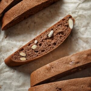 Cocoa biscotti on parchment paper.