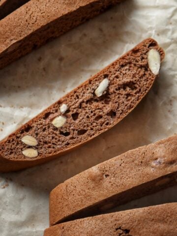 Cocoa biscotti on parchment paper.