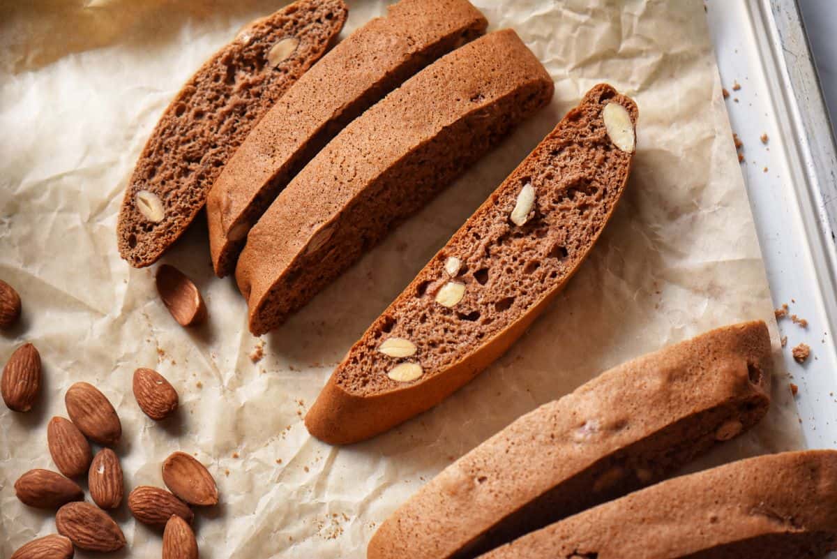 Honey cocoa biscotti on parchment paper.