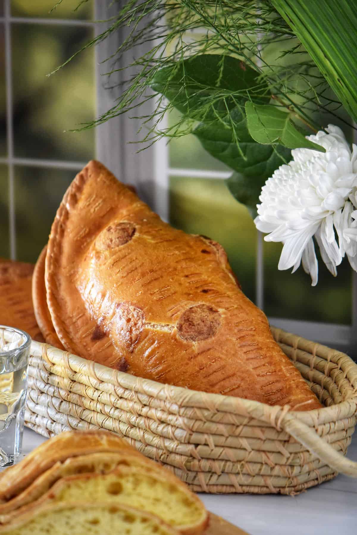 Italian Easter cheese pies in a wicker basket.