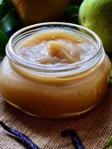 Pear butter in a Mason jar.