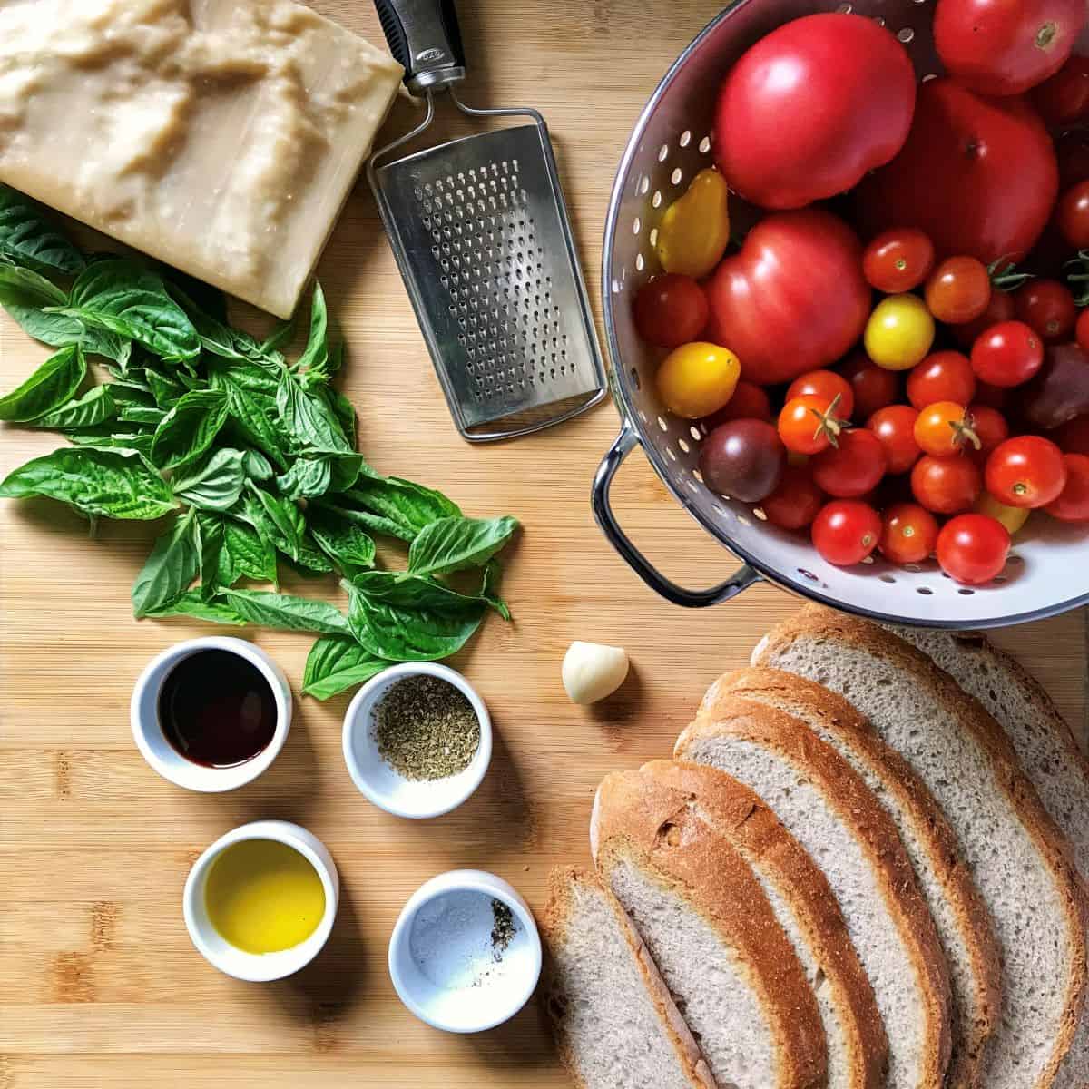 Some of the ingredients required to make Tomato Bruschetta include Italian rustic bread, garden fresh tomatoes and basil.