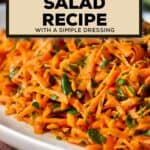 Shredded carrot and parsley salad on a white serving platter.