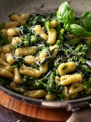 Cavatelli with broccoli rabe in a pasta bowl.