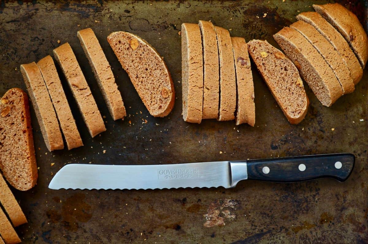 A knife and some sliced biscotti.