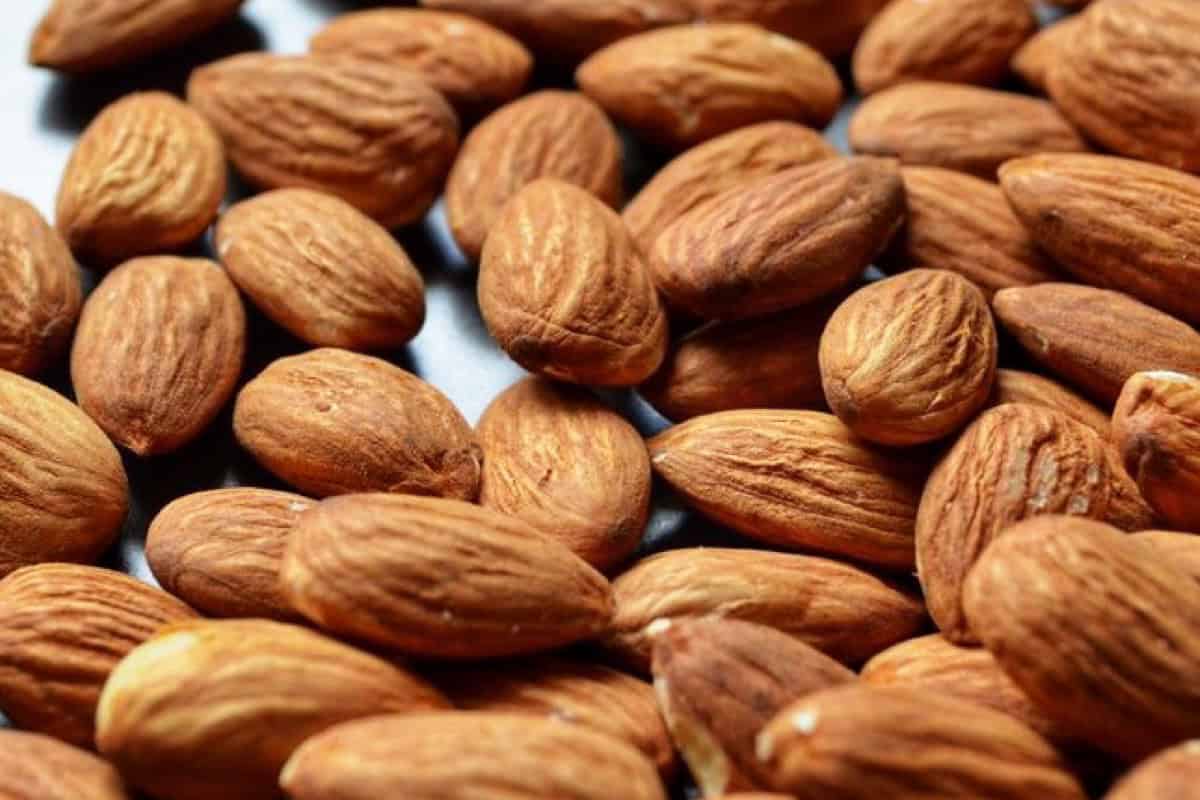 A close up of almonds with their skin.