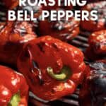 Roasted bell peppers on a grill, skins charred and blistered