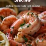 A Pinterest pin of shrimp in the process of being sauteed in a lemon wine garlic sauce..