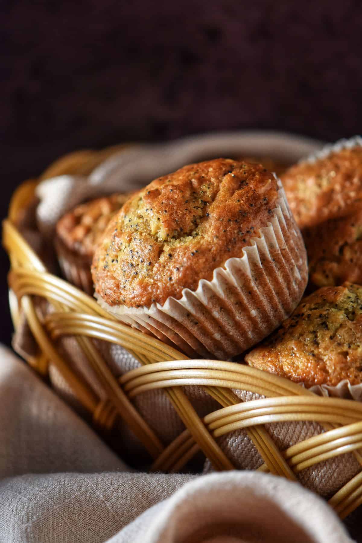 Lemon poppy seed muffins with buttermilk in a wicker basket.