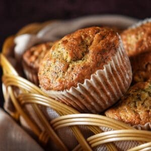 Lemon poppy seed muffins with buttermilk in a wicker basket.