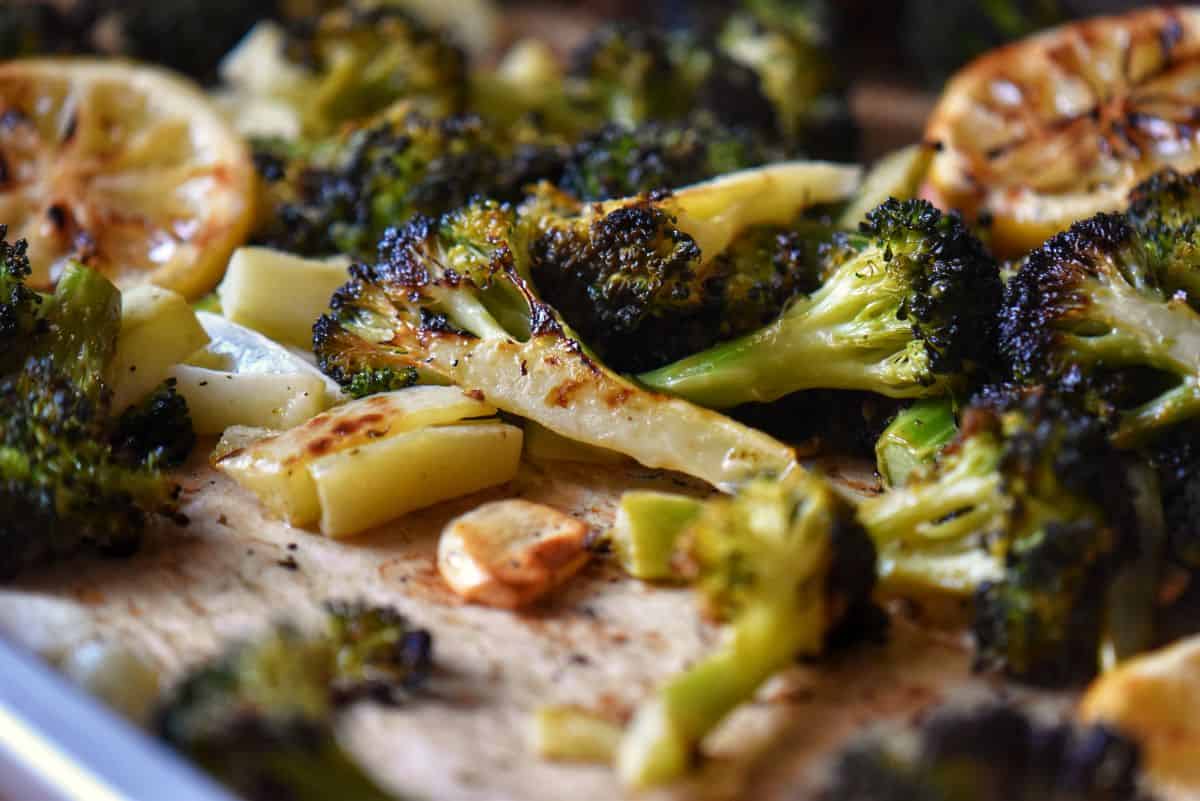 A close up shot of the super crispy edges of the oven roasted broccoli.