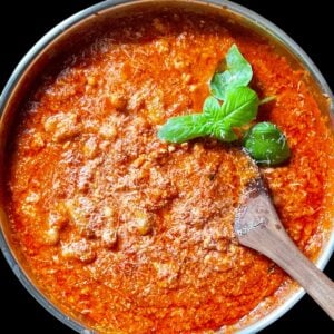 An overhead photo of pasta with tomato ricotta sauce.