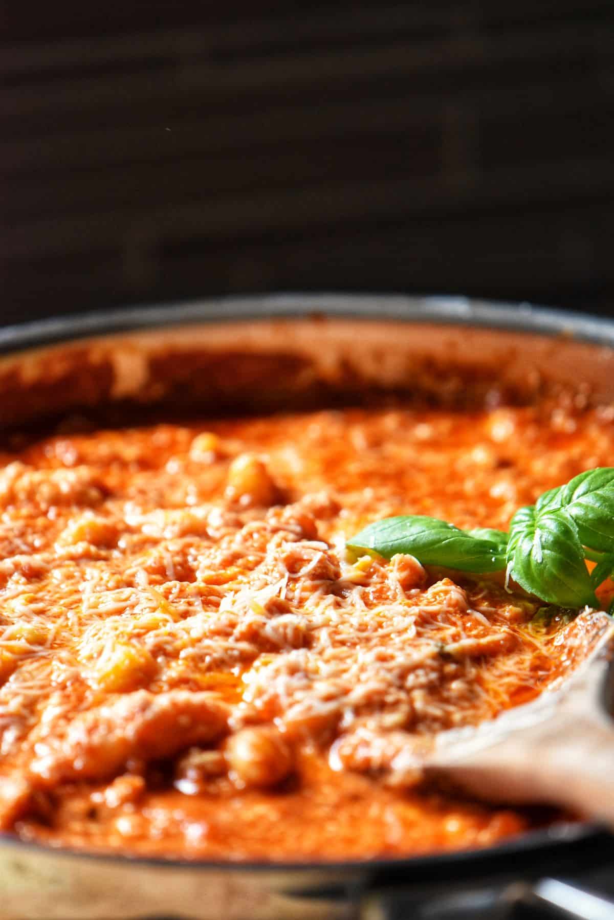 Cavatelli with tomato ricotta sauce in a large pan. 