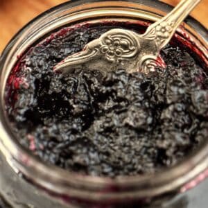 Blueberry jam in a mason jar.