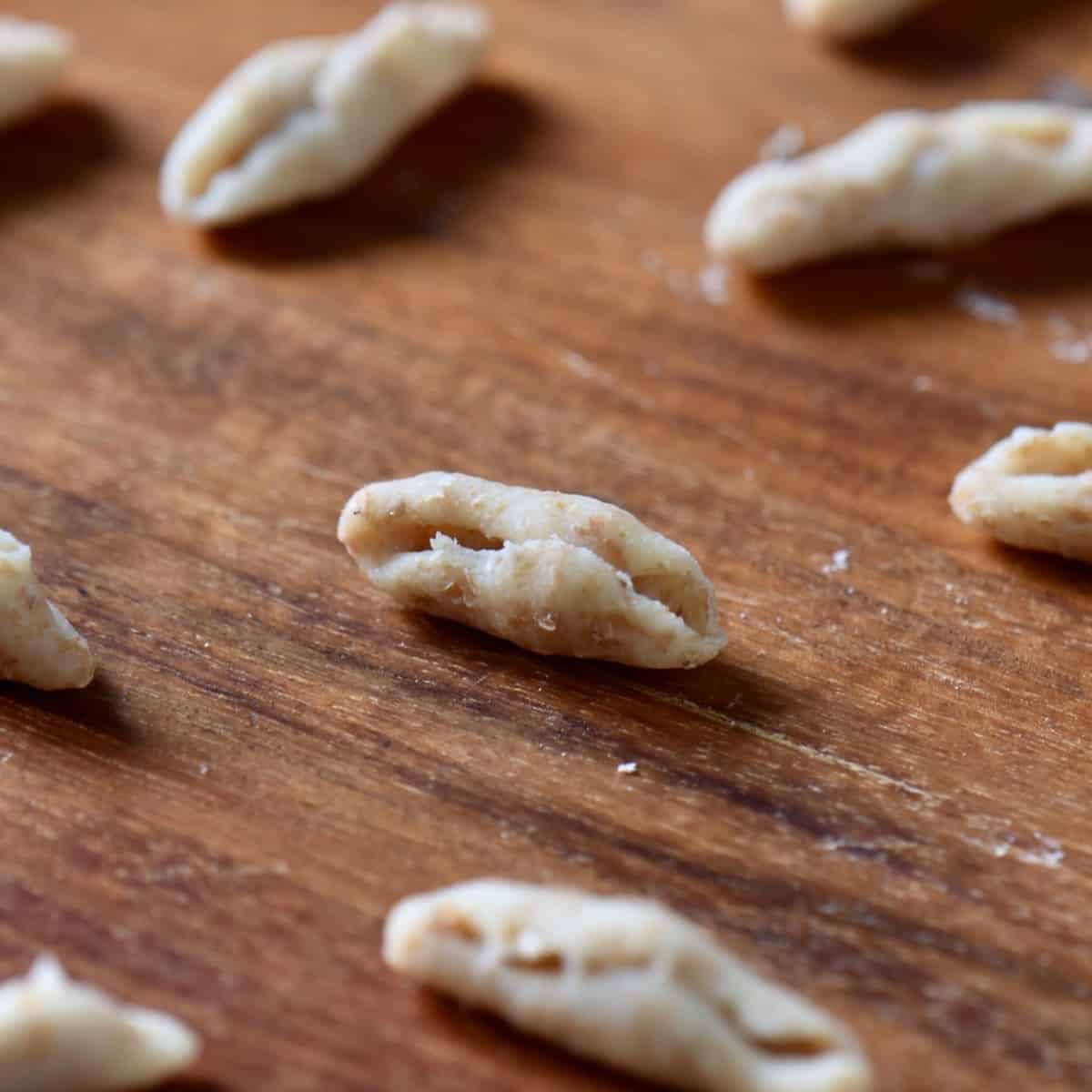 A close-up photo of whole wheat cavatelli pasta dough.