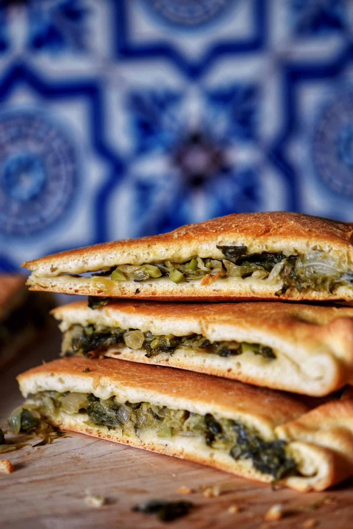 A stack of sliced escarole pie.