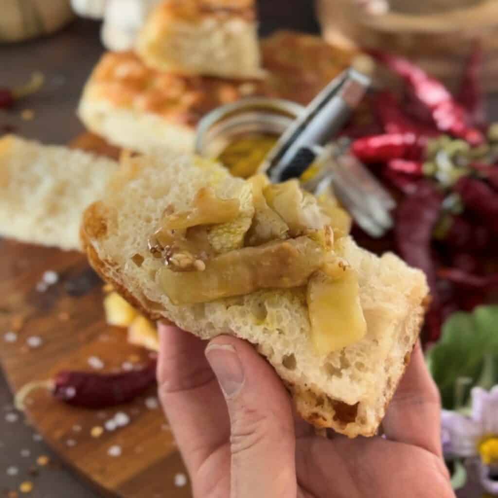 Pickled eggplant on focaccia bread.