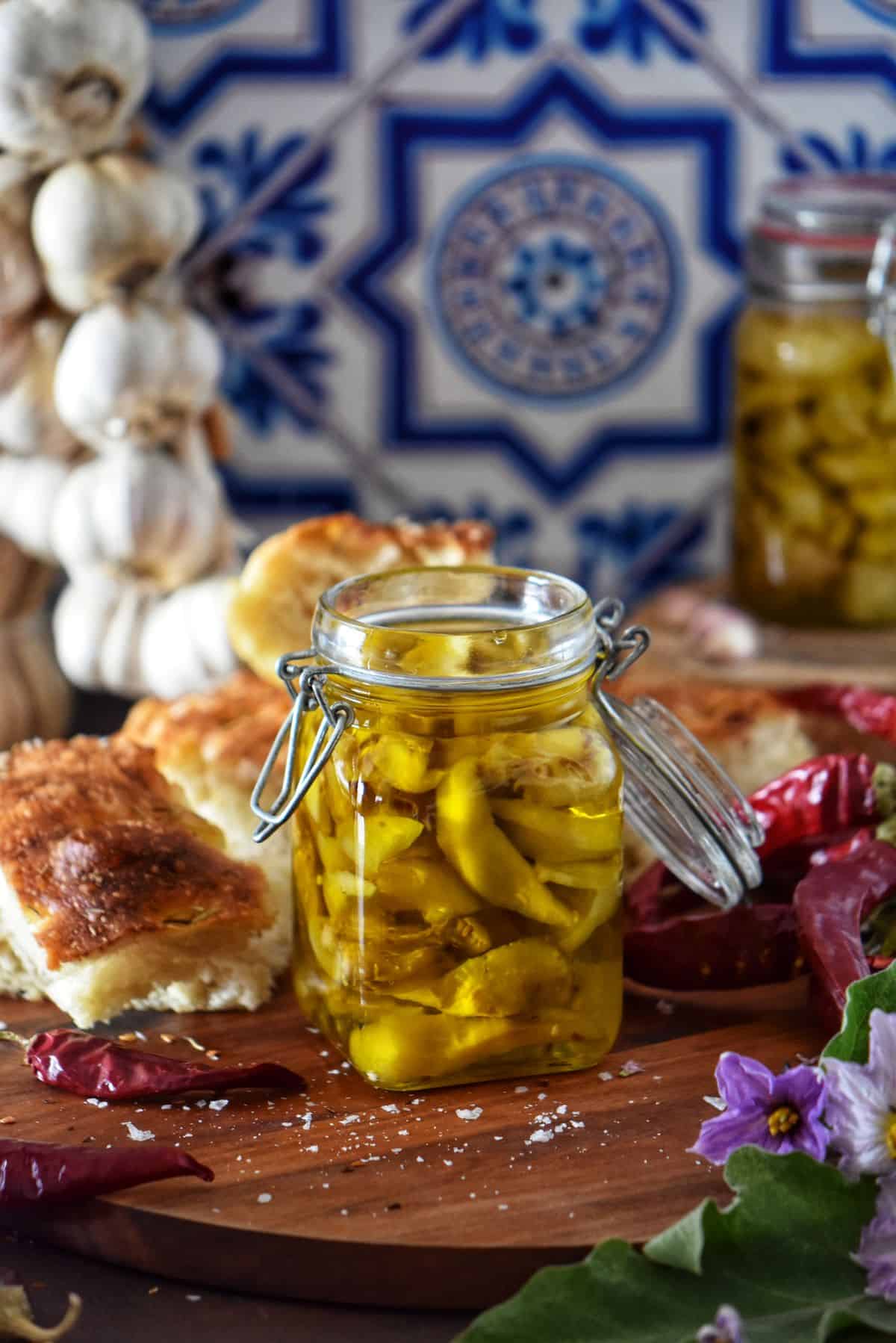 A mason jar of melanzane sott'olio or pickled eggplant.