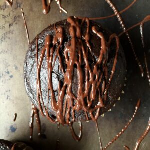 Espresso Cupcakes drizzled with chocolate glaze.