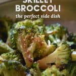Skillet broccoli garnished with toasted sesame seeds.