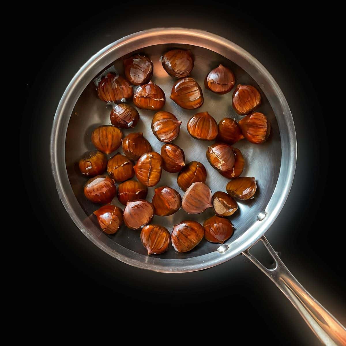 Chestnuts in a pan.