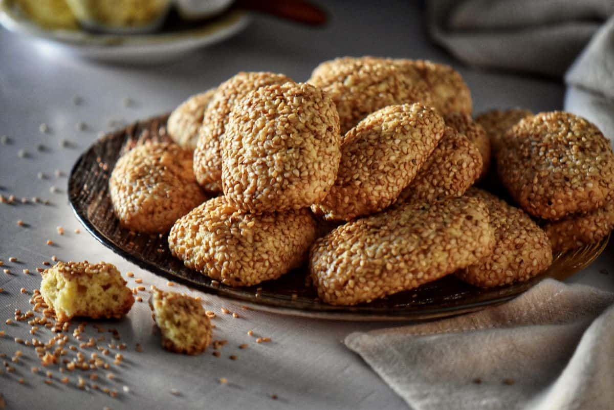 Close up of the crumbly buttery texture if sesame cookies.