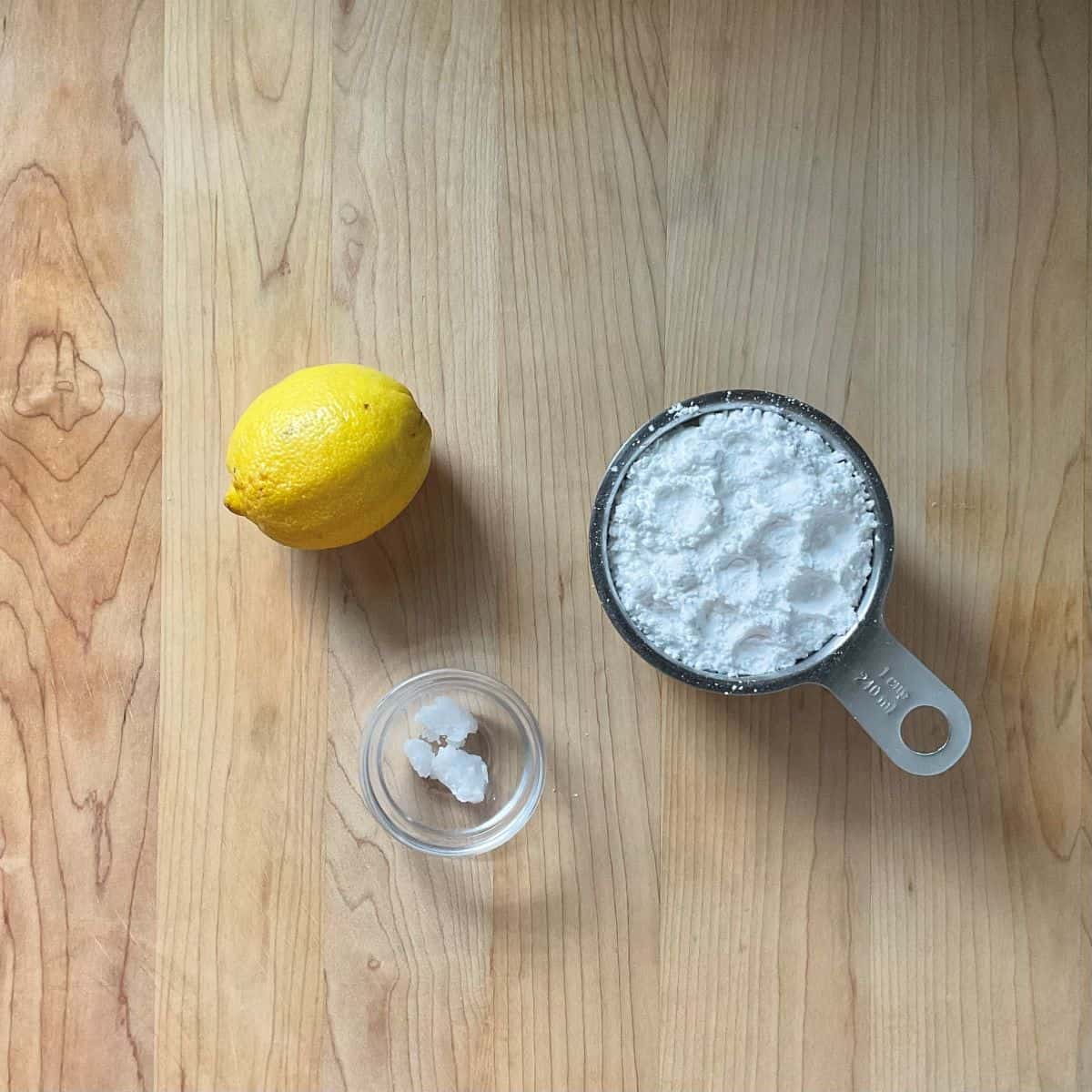 Ingredients to make lemon glaze icing.