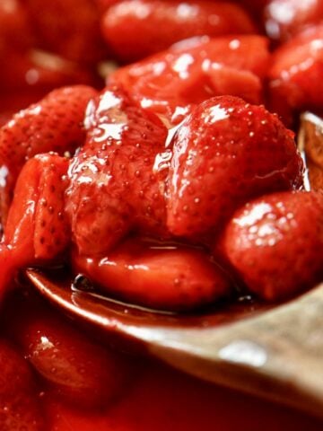 Baked strawberries in a baking dish.