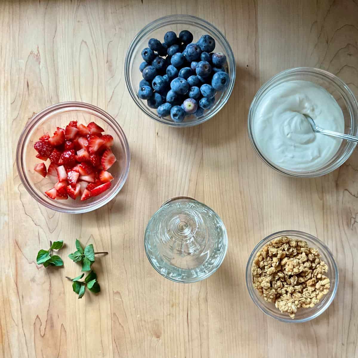 Ingredients are prepped to make a whipped ricotta parfait.