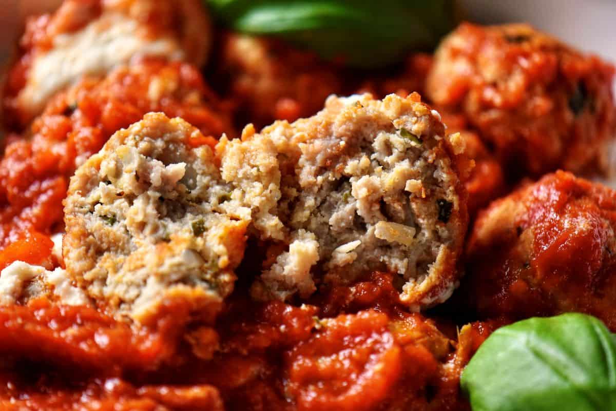 The soft interior of a meatball made with ricotta and veal.