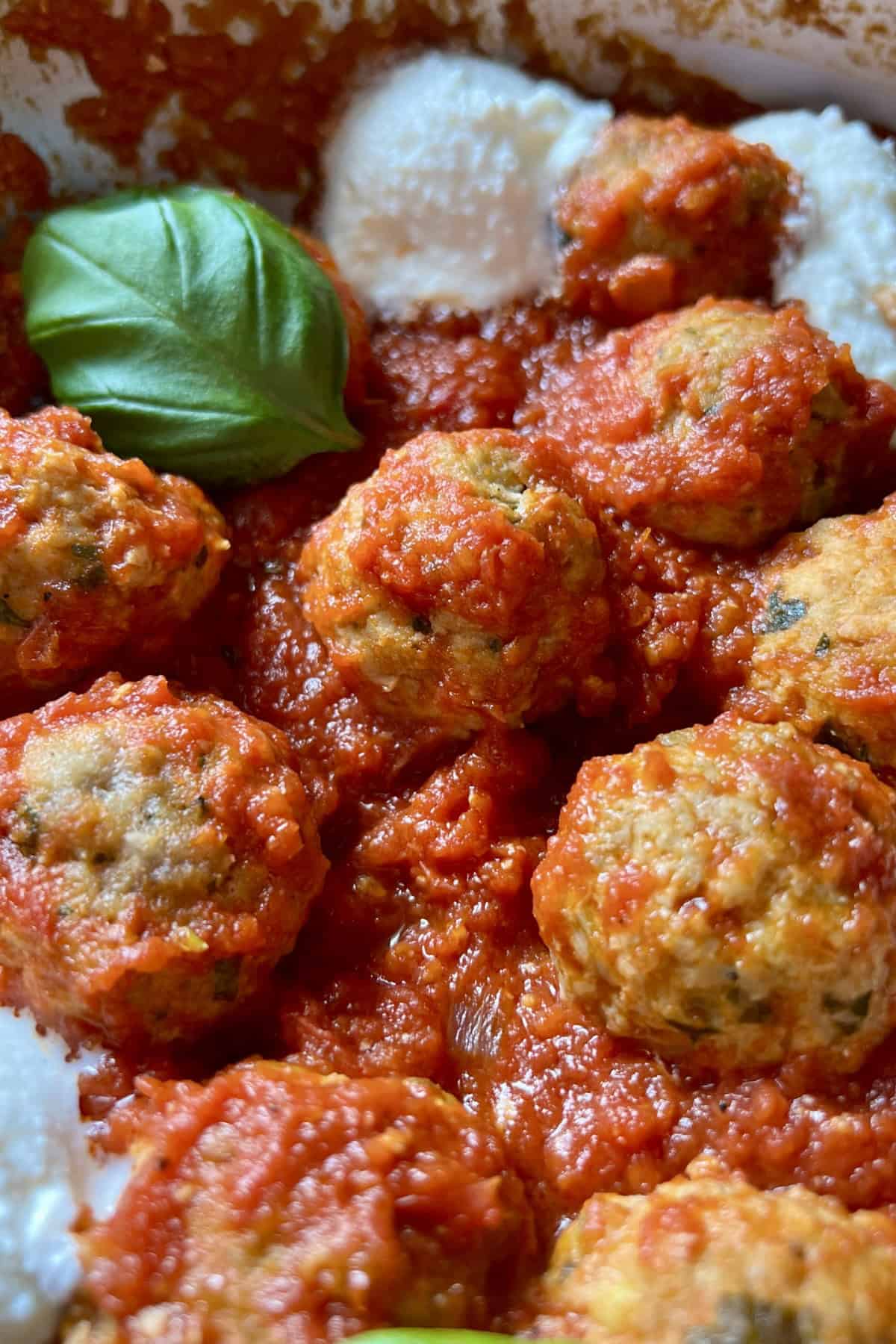 Ricotta cheese meatballs with marinara sauce.