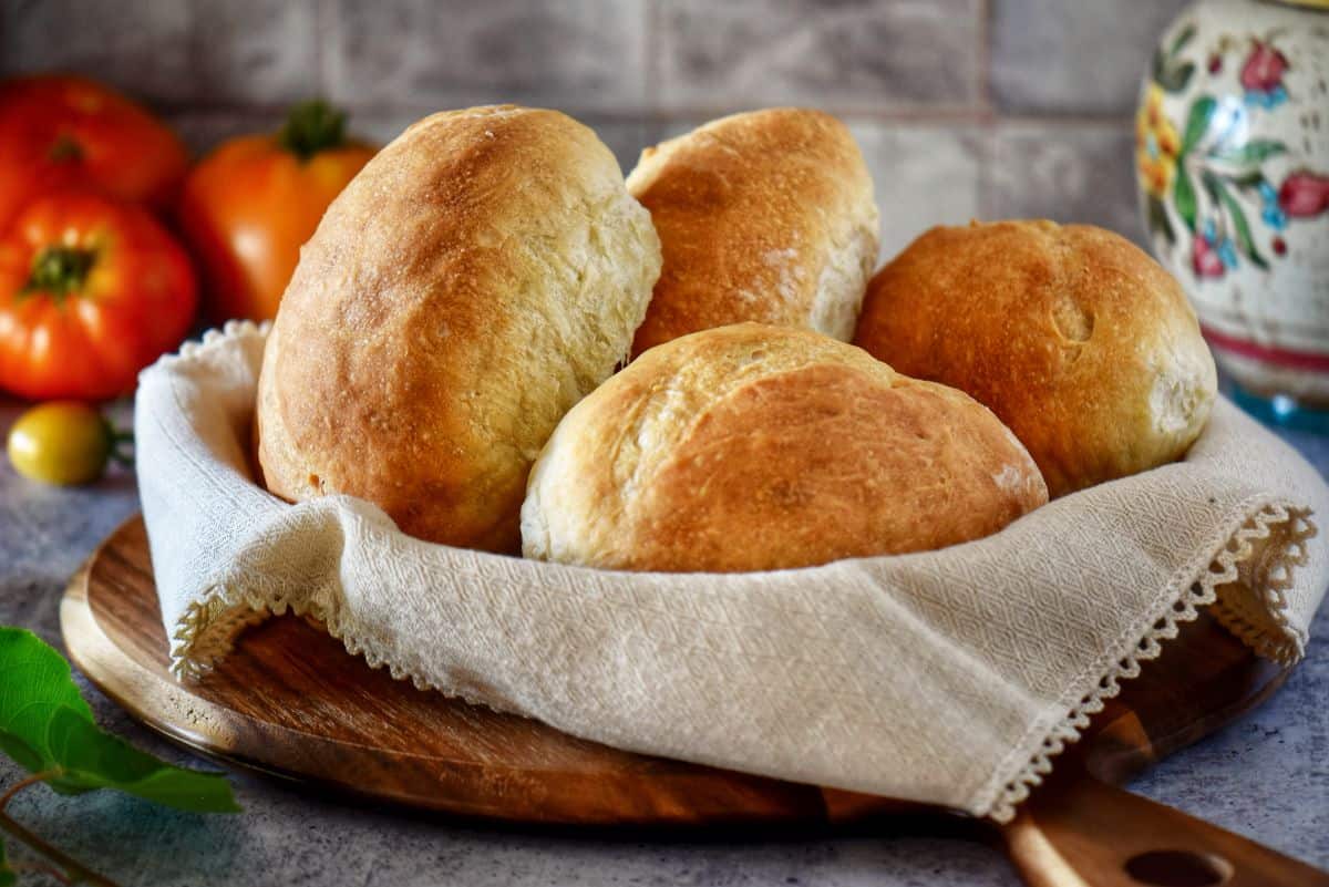 A basket of fresh homemade Italian panini bread.