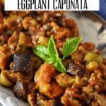 Eggplant caponata on a white serving dish.