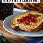 Italian breakfast toast with grape jelly on a white plate.