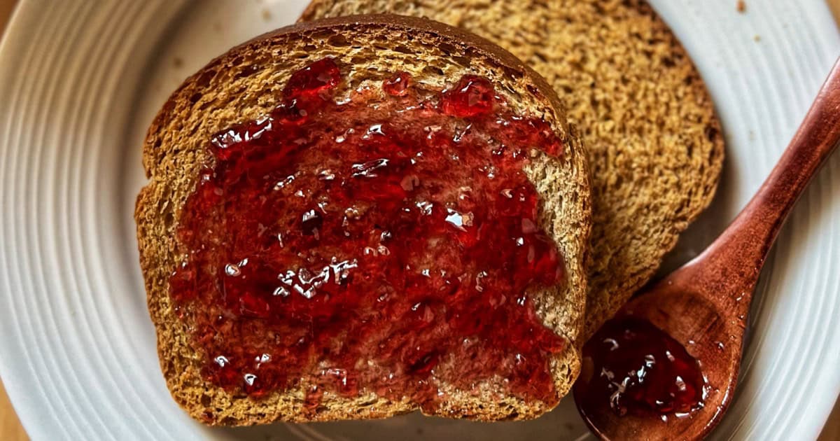 Concord grape jelly spread over an Italian breakfast toast.