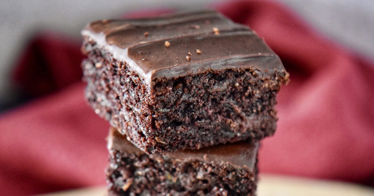 Close-up of the fudgy texture of chocolate zucchini brownies,