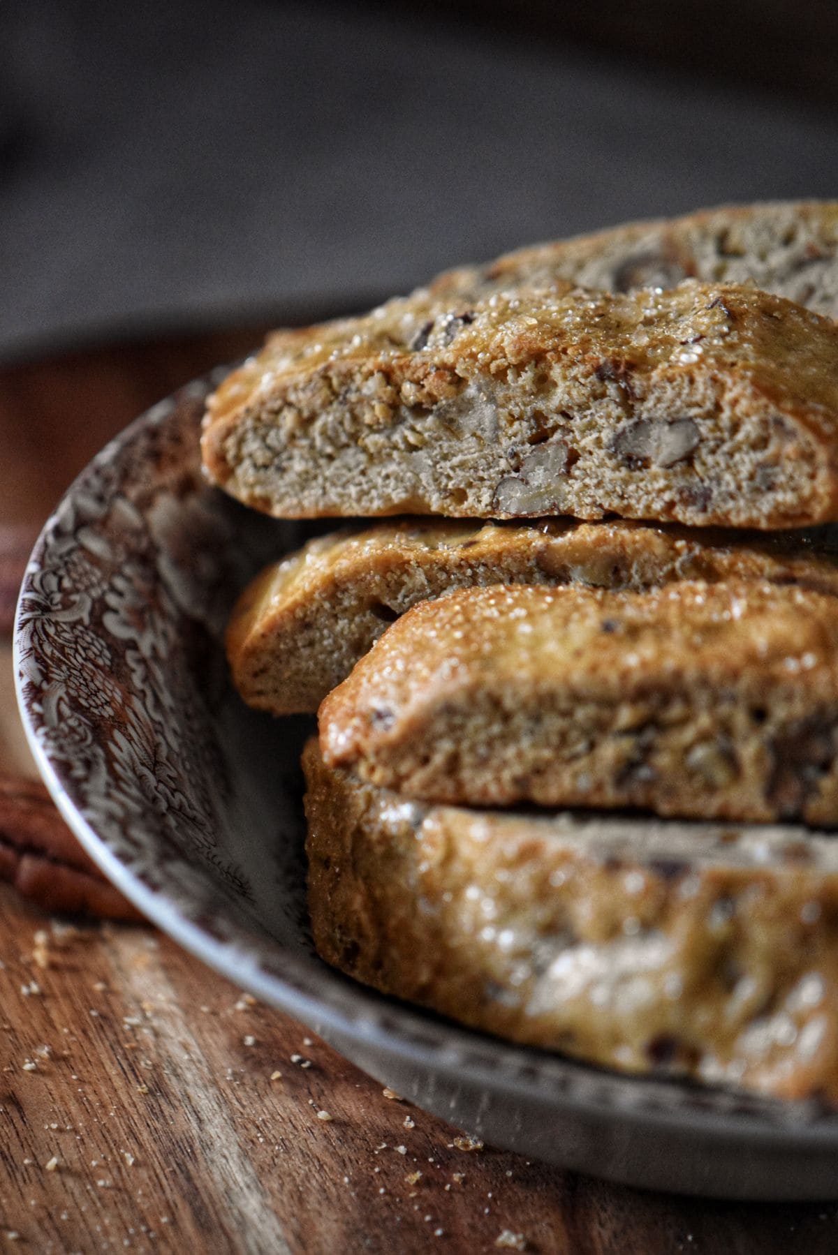 Detailed view of biscotti cross-section highlighting golden color and crumbly texture.